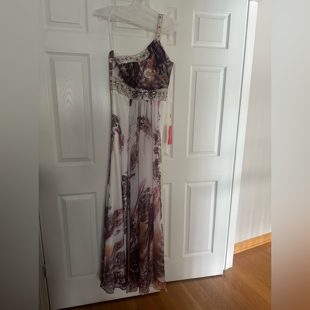 STUNNING one shoulder floor length gown with white translucent shall